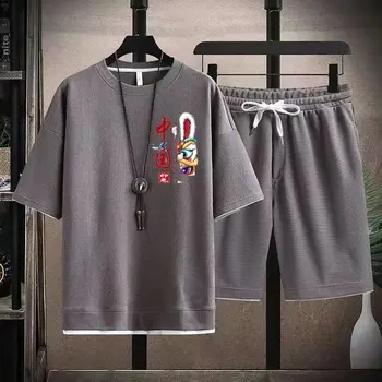 Летний новый костюм 2023, мужская повседневная свободная спортивная футболка из двух предметов с коротким рукавом, брюки пять четвертей, высококачественный полный размер M-4XL